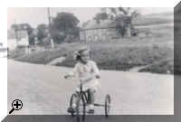 Diana Green in 1940. Note the village pump, shed on right of flint cottages